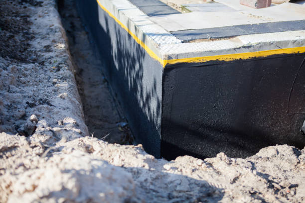 Professional Waterproofing technician working in Georgetown, OH